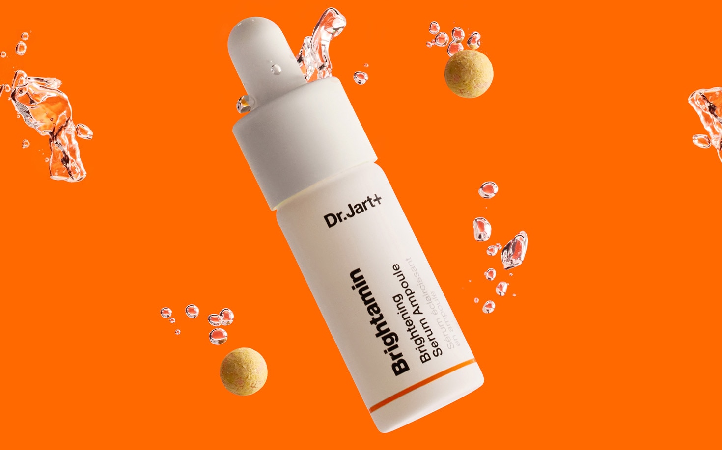 Brightamin Serum Ampoule and Brightamin Eye stick featured on bright orange background.