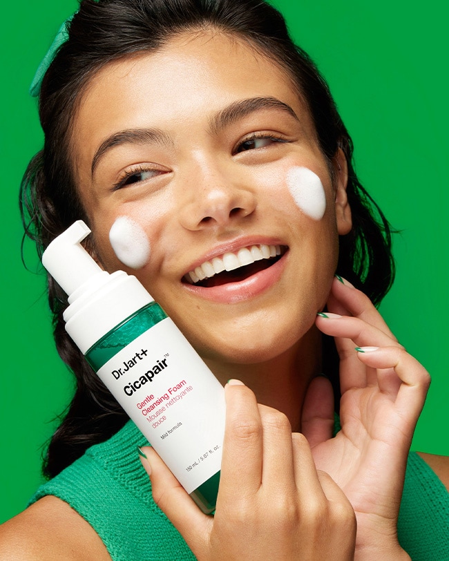 A dollop of Cicapair™ Gentle Foam Cleanser for Sensitive Skin is squeezed from tube