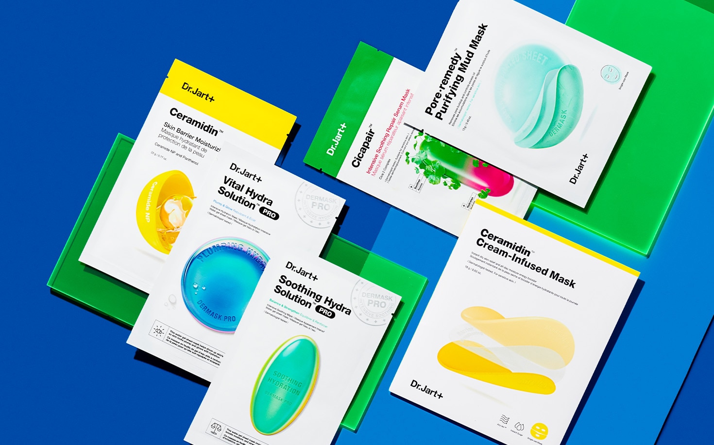 A variety of Dr.Jart+ skincare face masks are laid out on brightly colored background