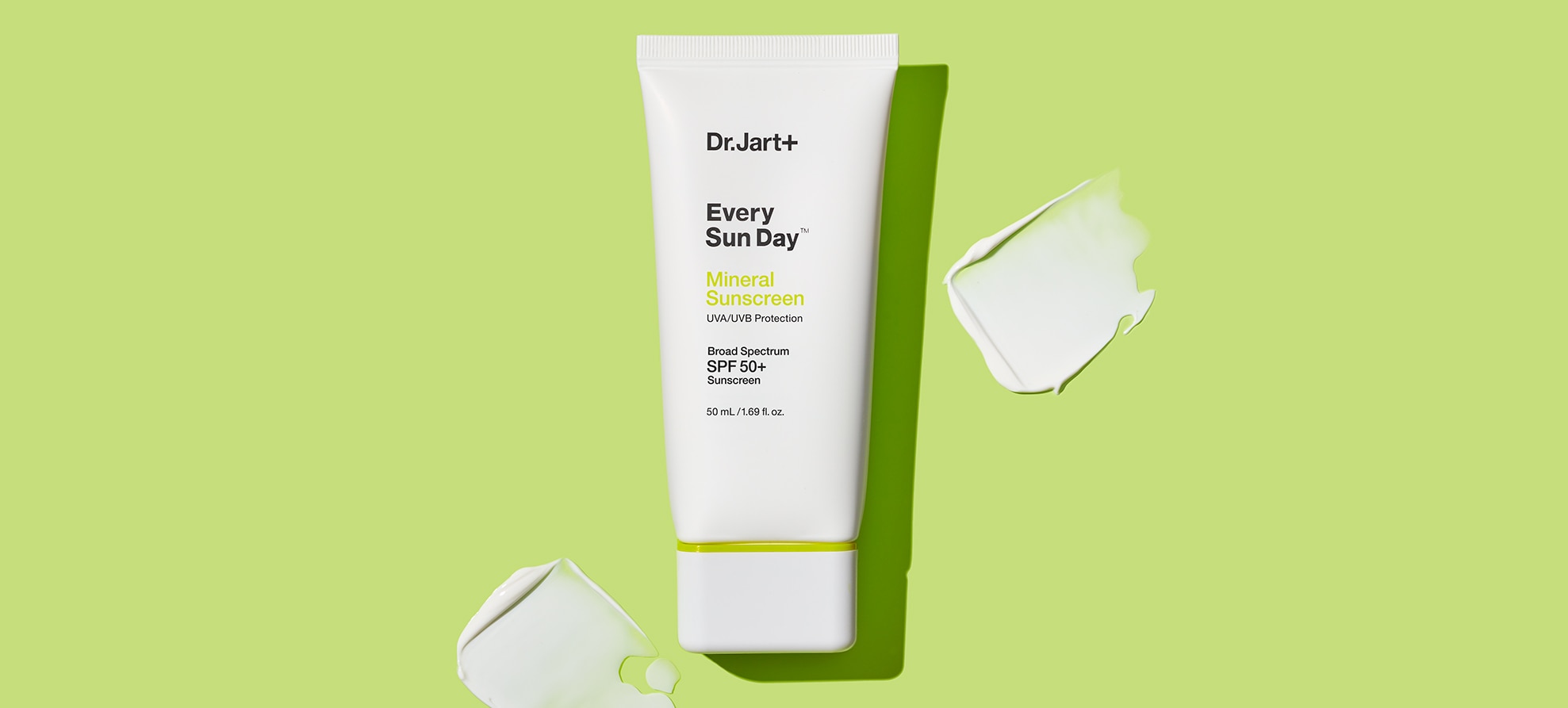 Every Sun Day Mineral Sunscreen bottle with dollops of creamy sunscreen texture